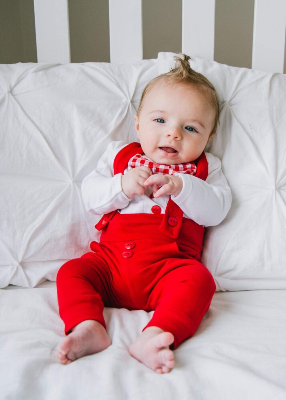 baby boy first Christmas outfit with red leggings and suspenders