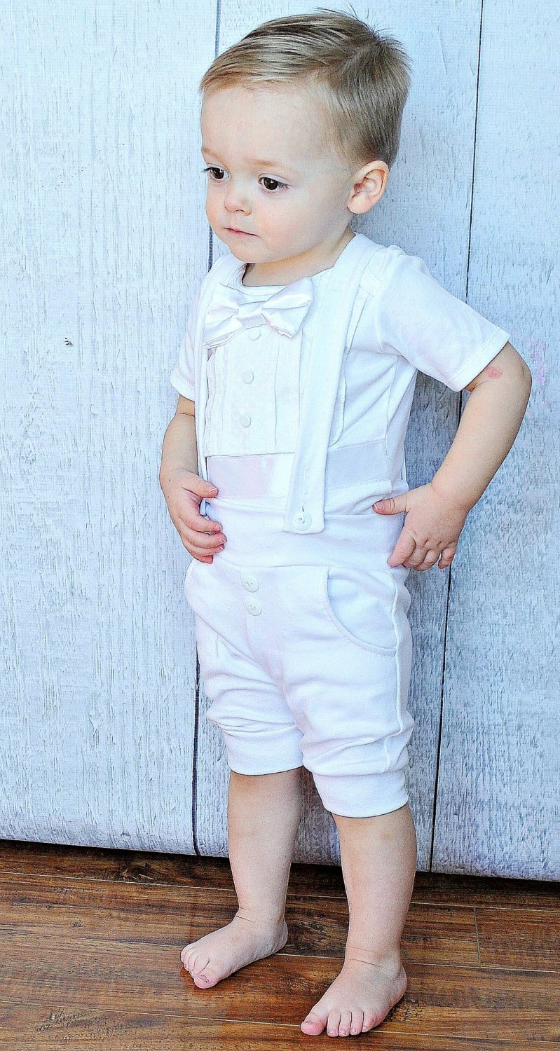 Toddler boy wearing Bebe Couture 2 piece baptism