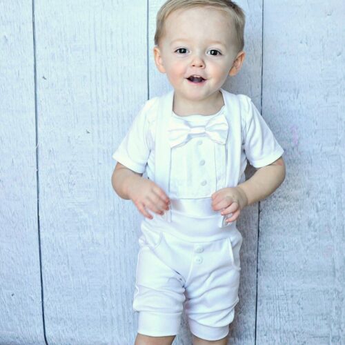 toddler boy wearing Bebe Couture 2 piece white summer christening outfit with shorts