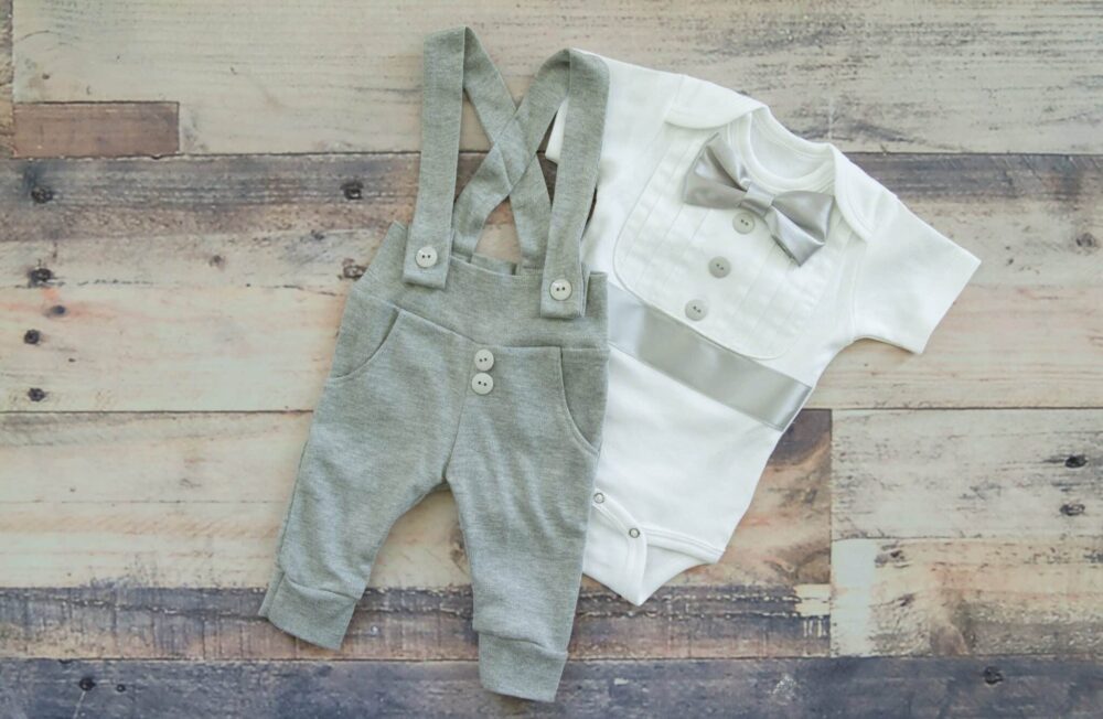 2 piece Bebe Couture grey baby tuxedo with short sleeves and grey bow tie
